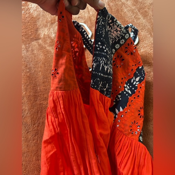 This image features the Free People Bossa Nova Eyelet High Low Dress - Picture 10 of 13